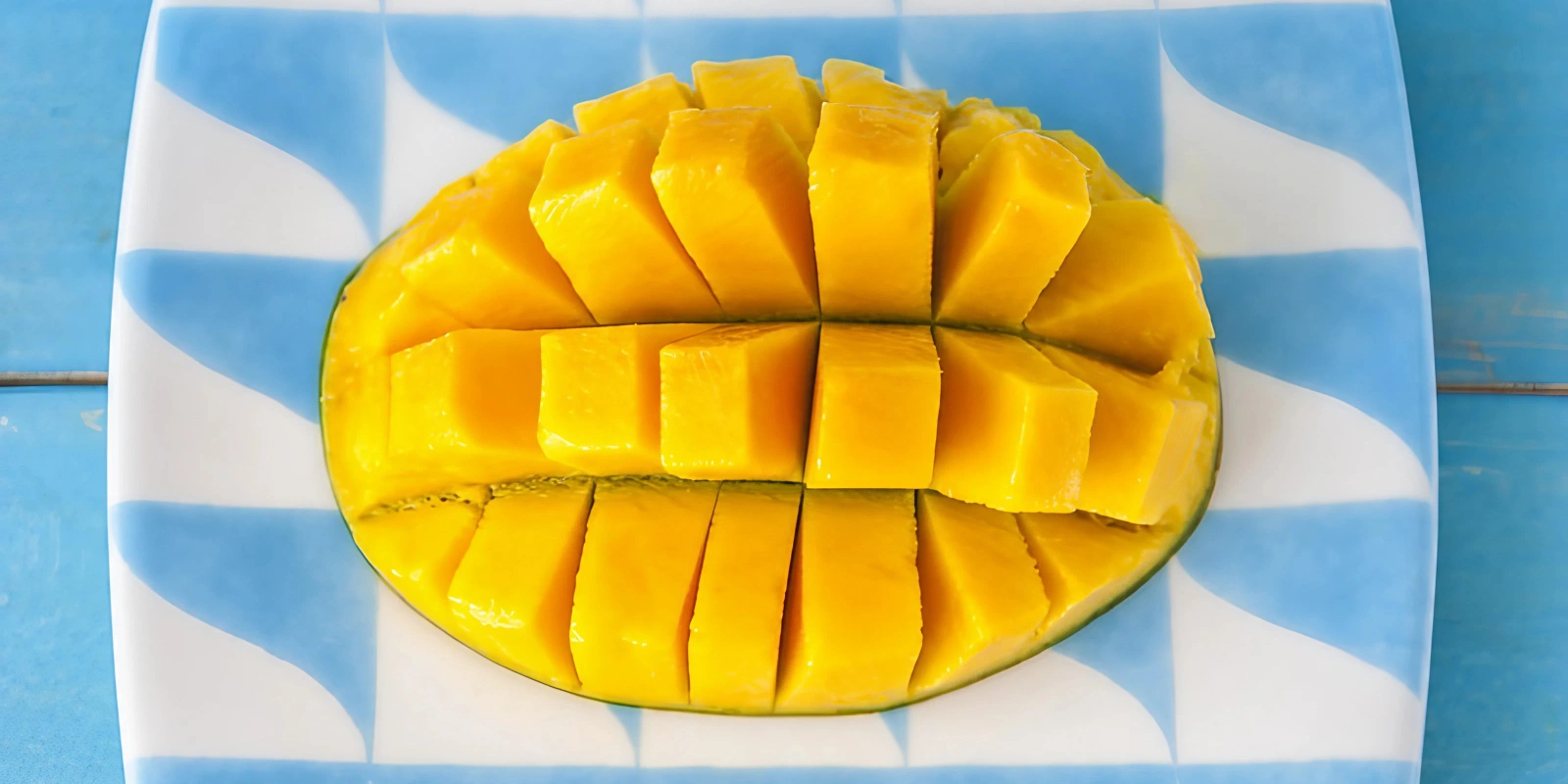 Summer fruits including mango on a plate